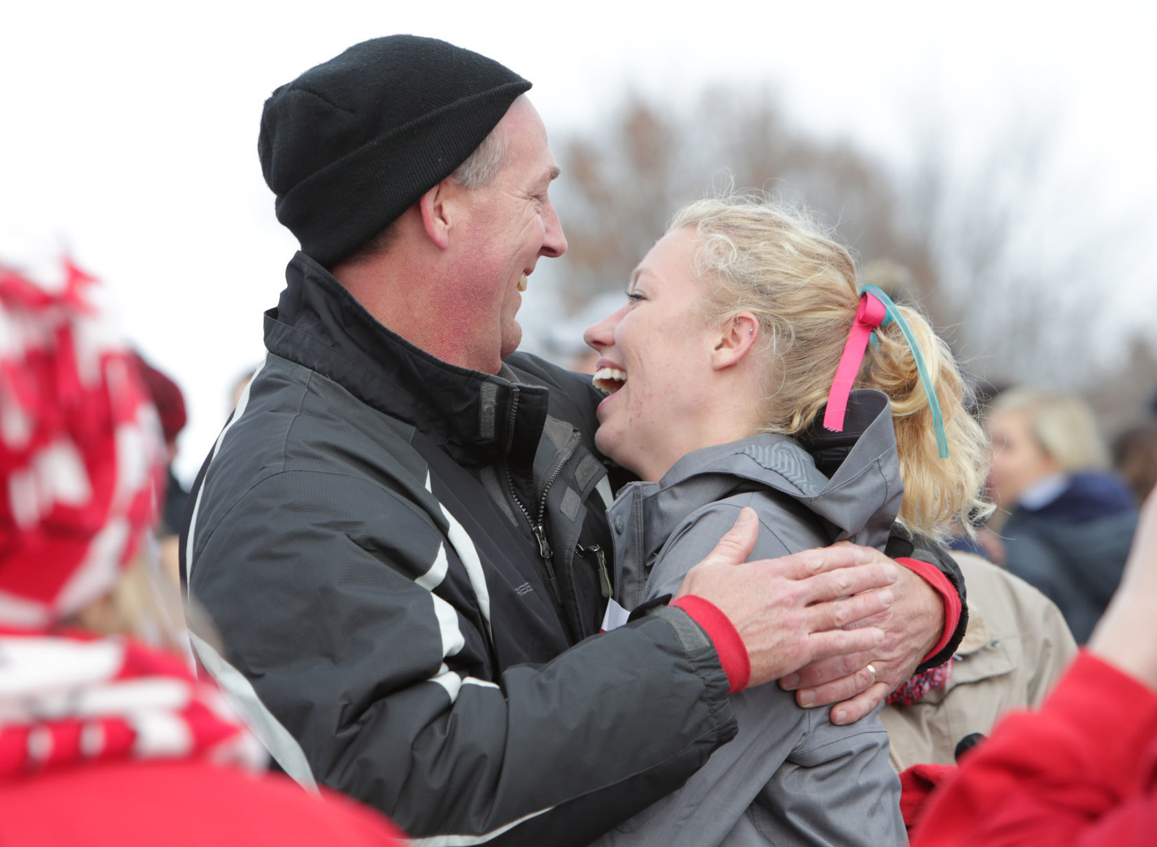 Alicia Monson hugs dad, State Journal photo